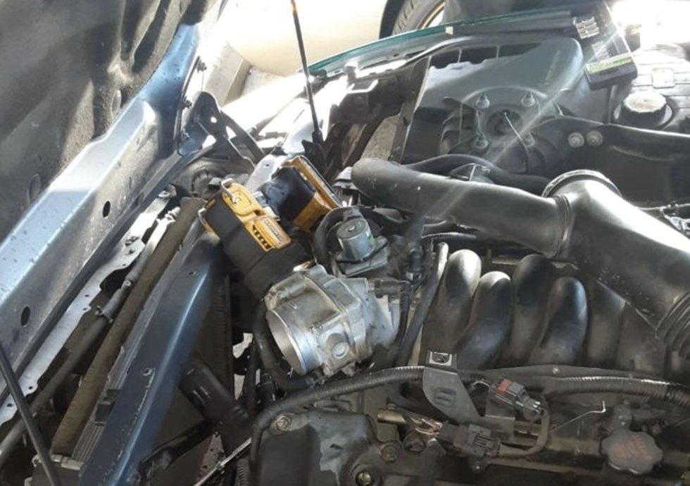 Under-hood repair on a Poquoson call near Newport News